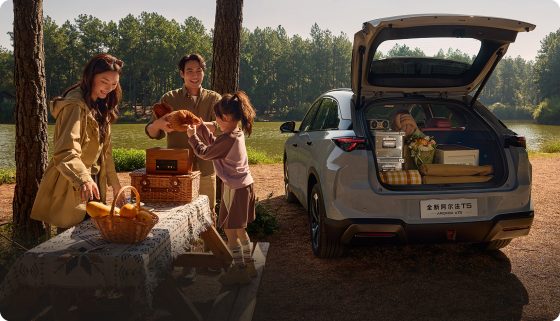 ARCFOX T5 with the tailgate open at a picnic