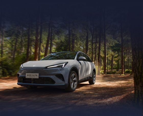 ARCFOX T5 in forest at night