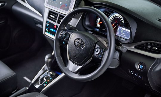 Toyota Yaris steering wheel and cluster